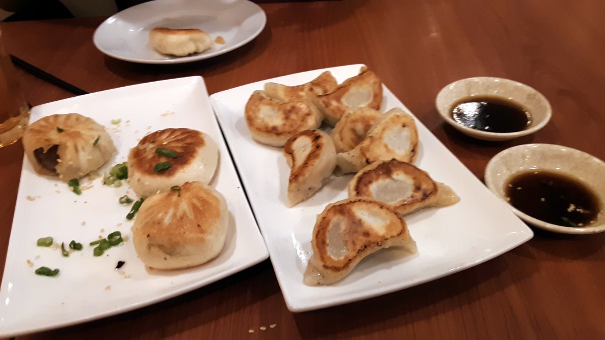 We split orders of excellent fried buns and pot stickers