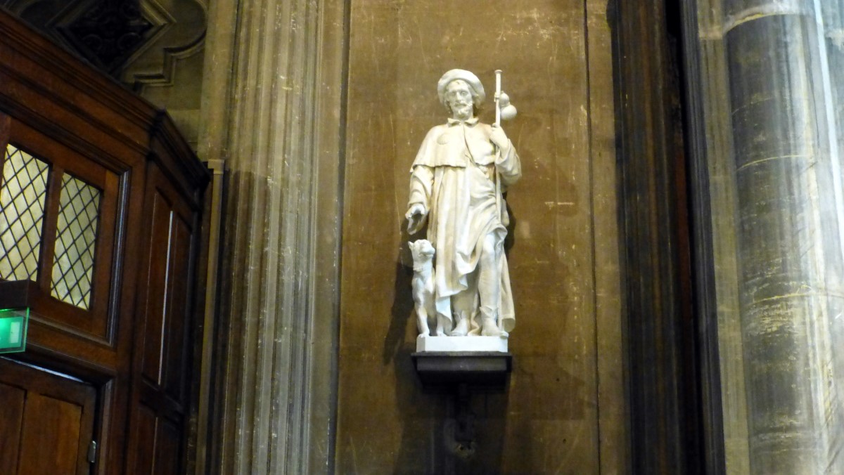 As I turned to exit the church, I saw this sculpture to the right of the exit. It appears to portray a wandering vagabond and his dog. It is Saint Roch who is a patron saint of, among other things, dogs, invalids, falsely accused people and bachelors. I was not able to find his connection to St. Augustine.