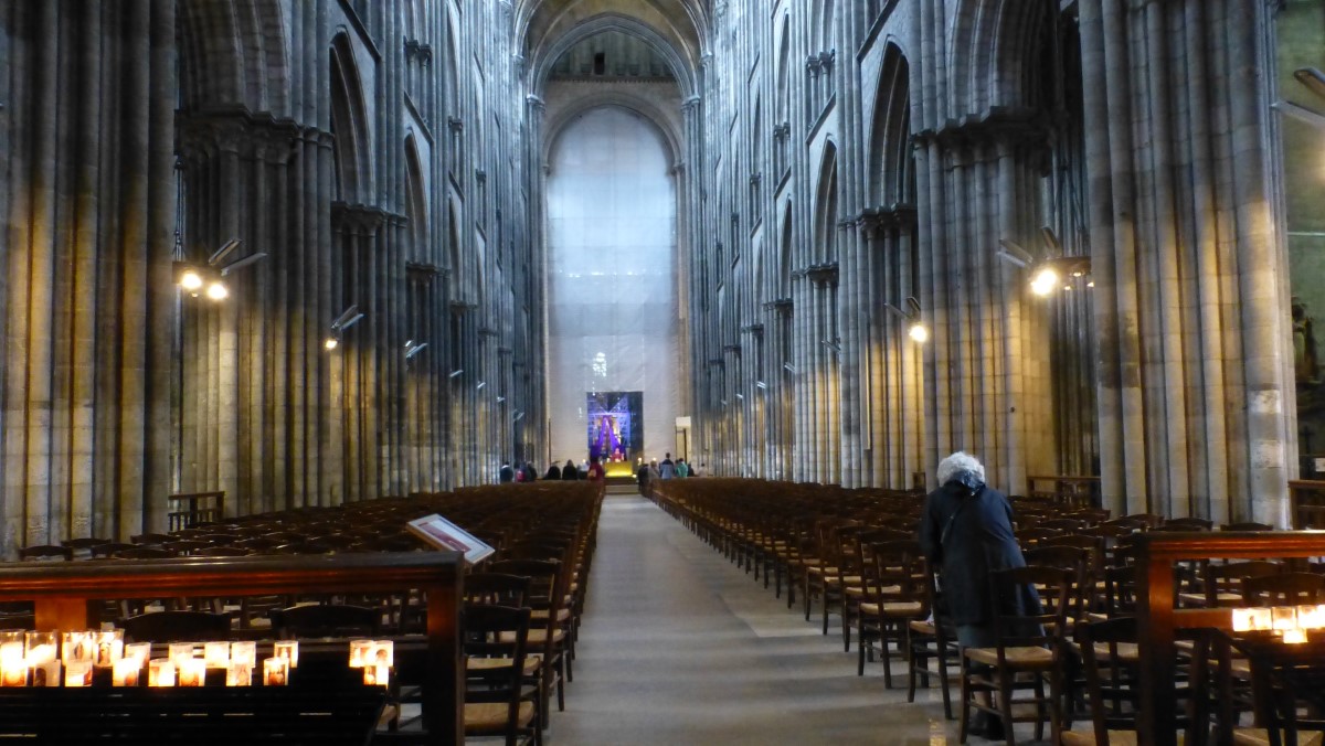 Looking toward the Choir, you get a sense of the immense proportions of the Cathedral. Unfortunately, due to renovations, a large curtain hides the Choir. And due to services being held, I could not get to the Chapelle de Jeanne d'Arc.