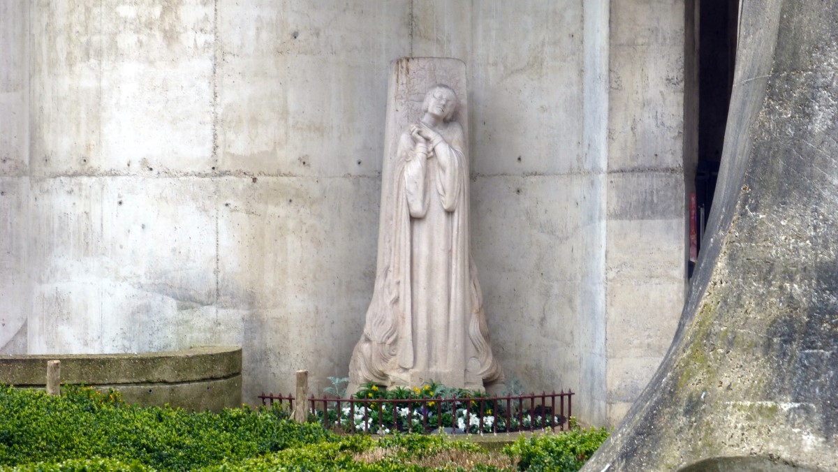 This statue of St Joan is just to the left of the entrance to <i>L'église Sainte-Jeanne-d'Arc</i>. It is a modern building constructed in 1979. After all, St Joan was not canonized until 1920. This church lies only feet from where she was burned at the stake.