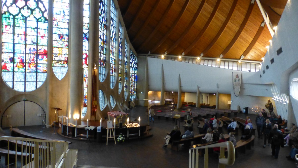 The interior of <i>L'église Sainte-Jeanne-d'Arc</i>. It is not a large church probably due to its location in the city center.