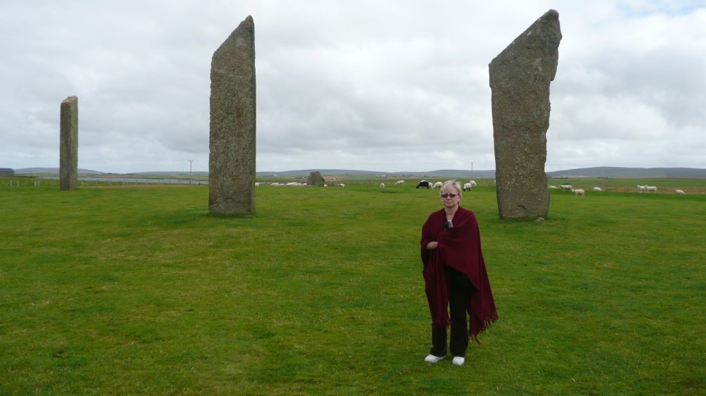 My friend, Sharon, standing among the Stones of Stennis. Check out the lone black sheep in the background (2008).