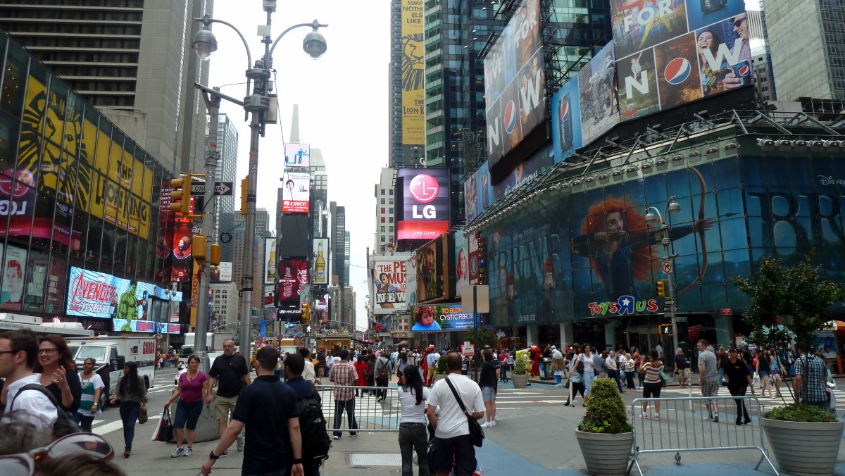 World famous Time Square with the hustle and bustle of people seemingly wandering aimlessly.