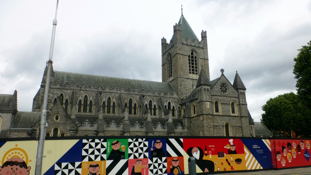 Christ Church Cathedral from the gate to our apartment. Here you can see the flying buttresses that made these tall buildings possible. Also, you see the colorful signs surrounding a construction site.