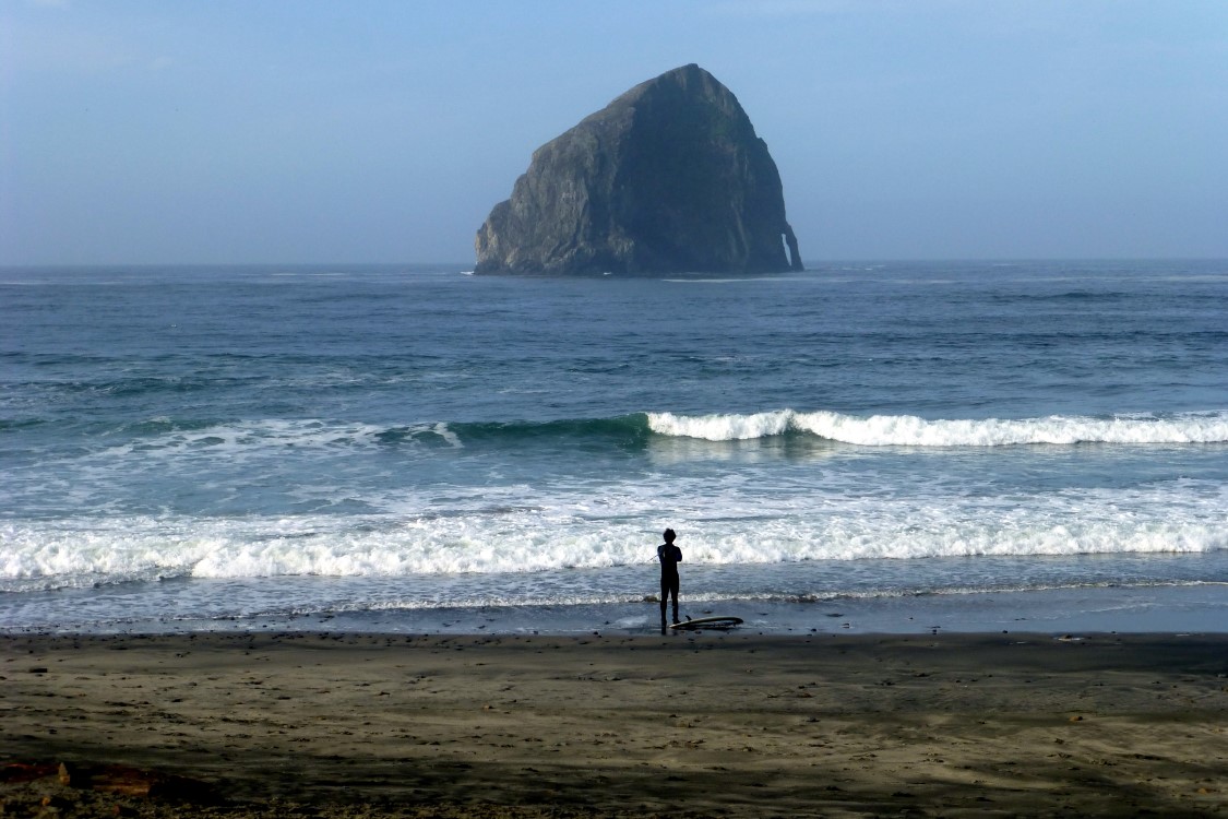 To surf or not to surf. Hmmm….. (The rock in the background is Chief Kiawanda Rock)