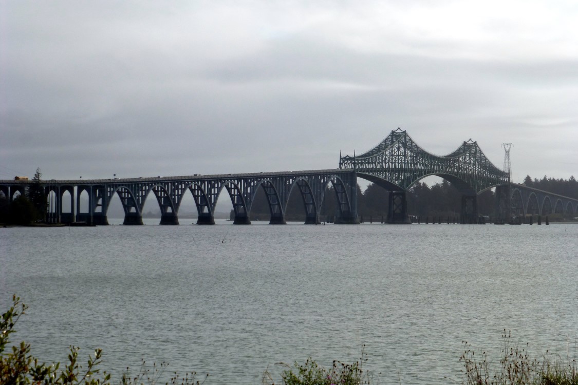 The McCullough Memorial Bridge is another Conde McCoullough design originally named the Coos River Bridge. Built in the 30s, it was renamed after his death in 1946. The main span is 793 feet in length and clears the bay by 145 feet.