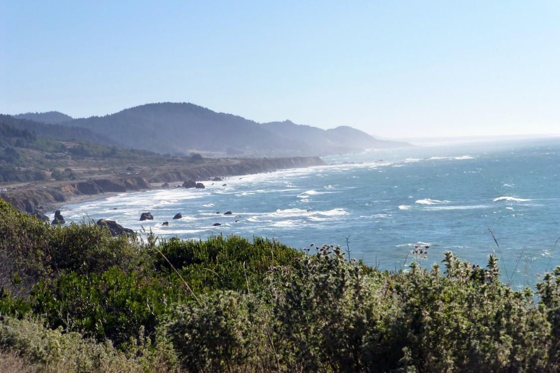 A long stretch of wild coastline shot from the moving car by holding my camera above the windshield.