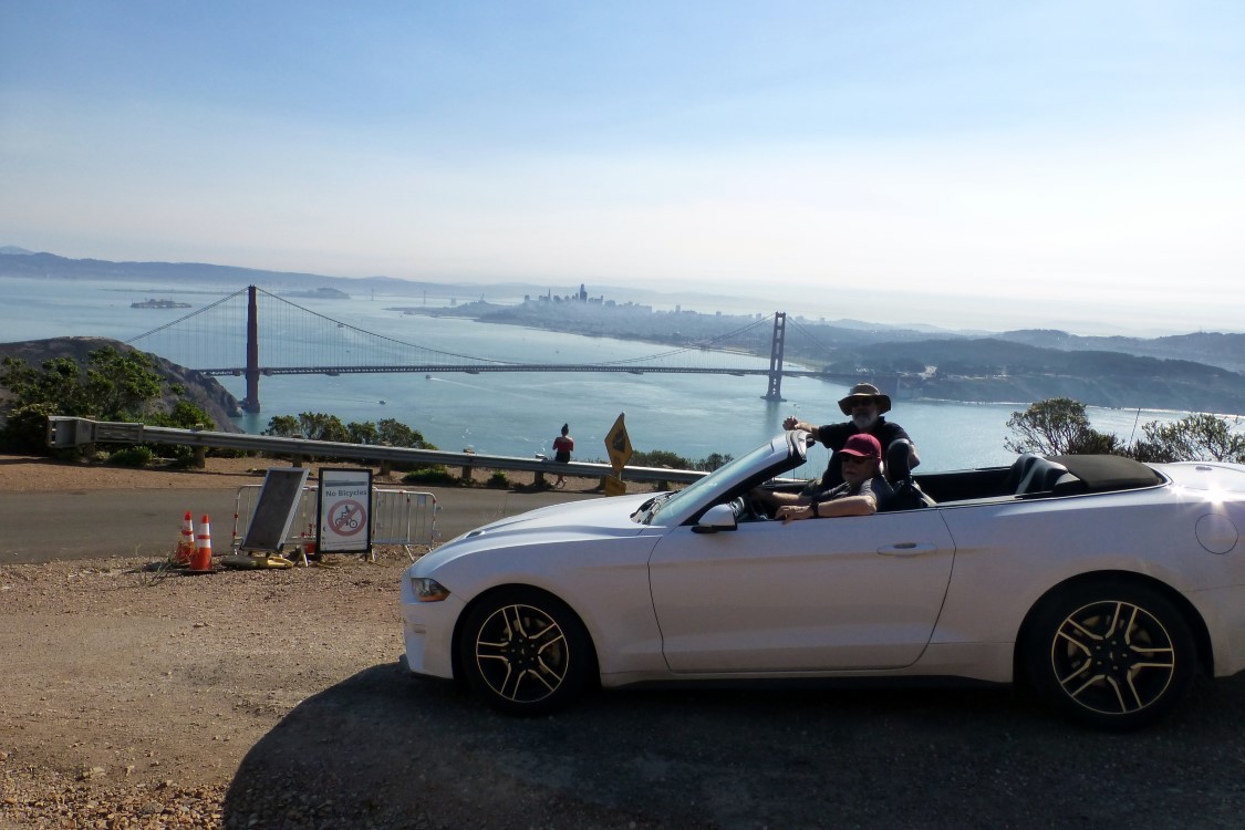 Me and Jr in our Mustang overlooking the Golden Gate Bridge and the city of San Fran from the Marin Headlands Vista. You can see Alcatraz Island just to the left of the leftmost bridge tower. (And some chick that crashed our photo!)(And thanks Lee for setting me straight on Alcatraz.)