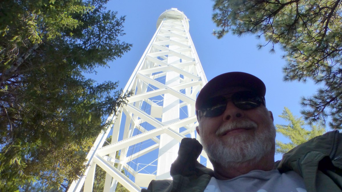 Here's a selfie looking up at the 150ft Solar Telescope Tower. Two mirrors feed sunlight to a 12 inch lens with a 150 ft focal length.