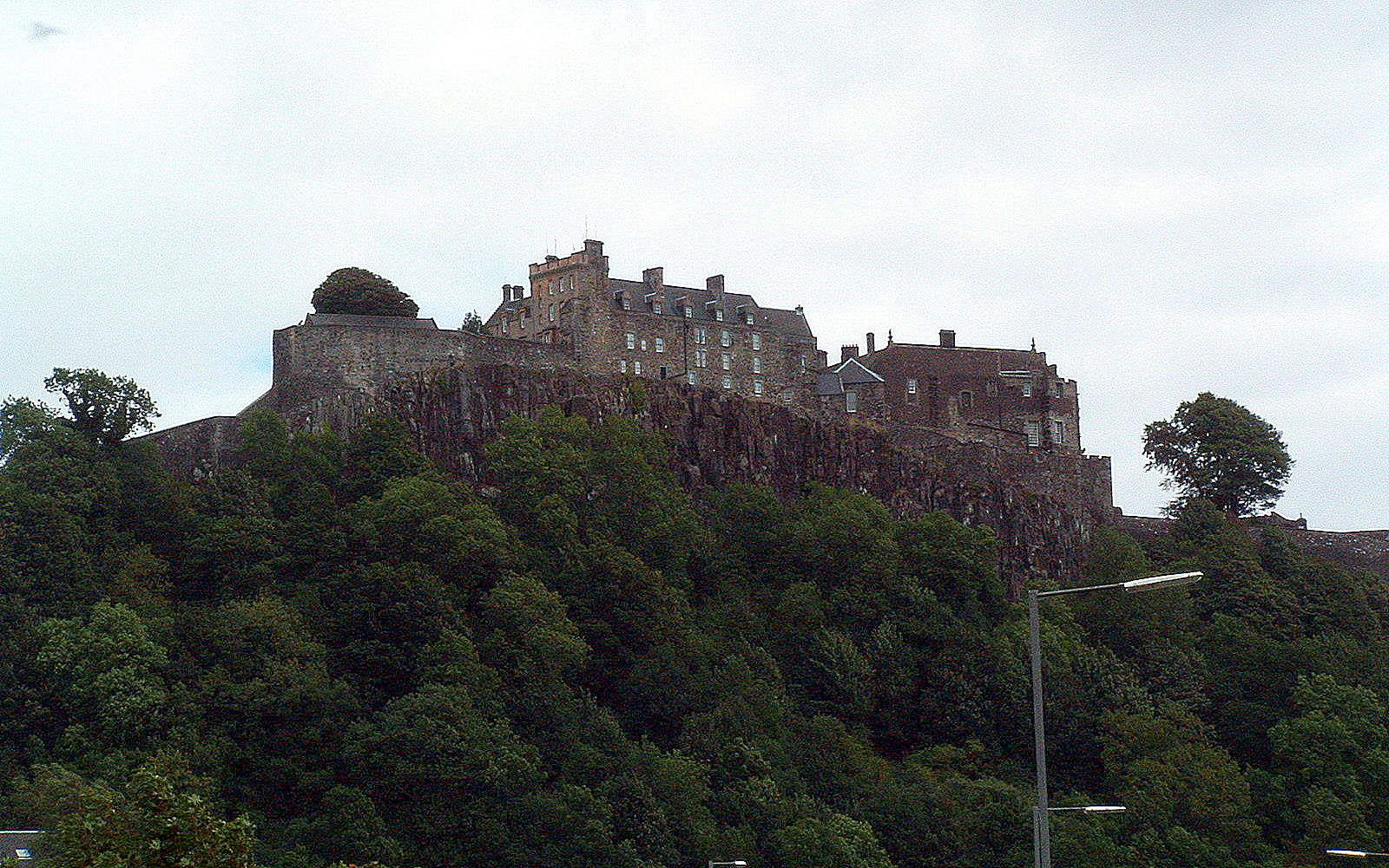 Stirling Castle sitting on the volcanic outcrop from the B0851. (2003)