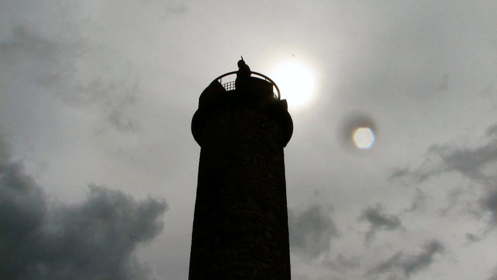 The Bonnie Prince standing atop the tower with a feather in his bunnet