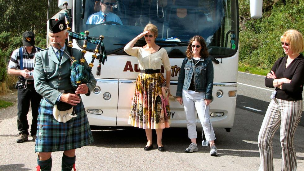 We came upon this gentleman busking at a roadside stop above the banks of Loch Ness.