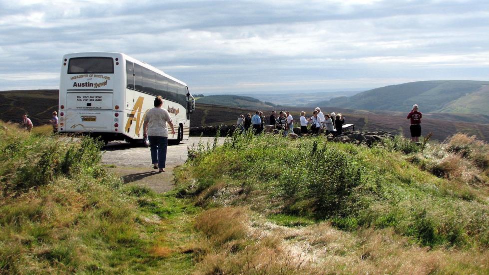 We disembark the coach to experience the blooming heather.