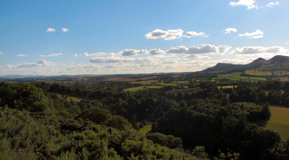 Scott's View - Sir Walter often stopped here while horse riding. Here he looked across the River Tweed to the Eildon Hills. On his death, as his hearse passed the View, his horse paused for his master one last time.