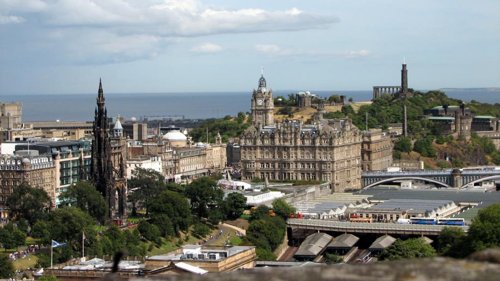 From the battlements of the Castle, the dark monument on the left is the Scott Monument, the large clock tower is the Balmoral Hotel and the tower structure on the right is Nelson Monument on Calton Hill.