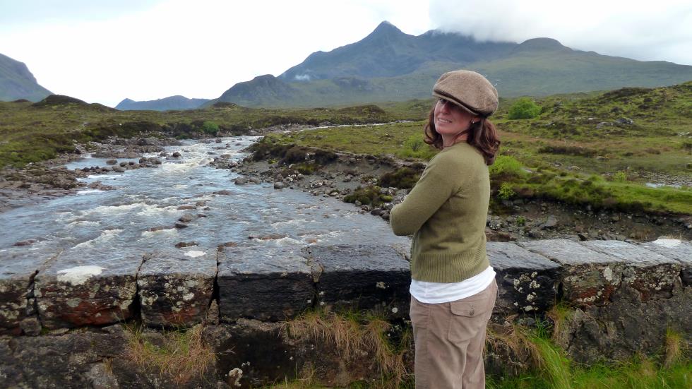 Here Amy is standing on the old bridge over the Sligachan River on the Isle of Sky with the Cuillin Hills in the distance.