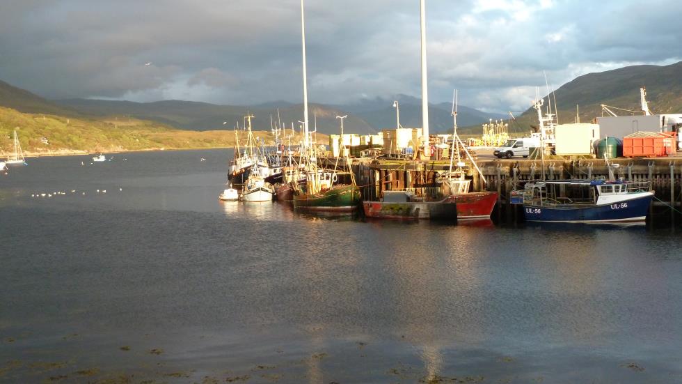 In Ullapool, I caught this moment of golden light on the ships in the harbor.