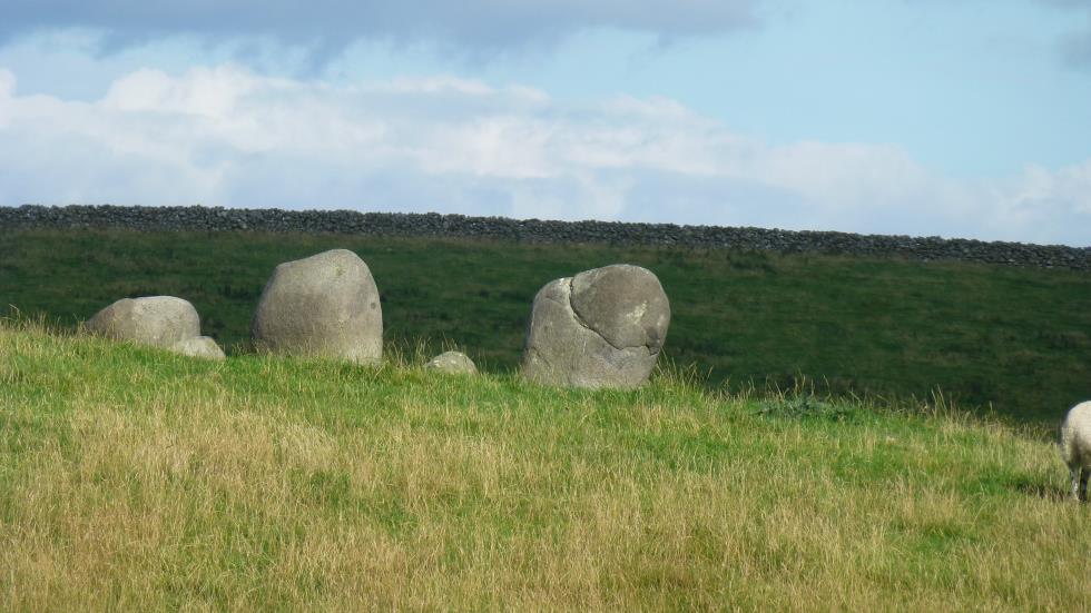 The three stones in the distance. Looks sorta like a big toe and a couple of lesser toes.