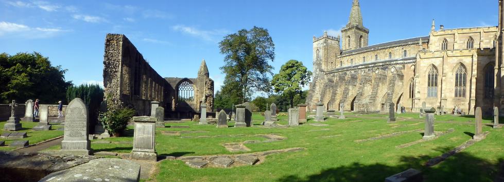 A panoramic view with original Abbey to the right and the Cloister to the left.