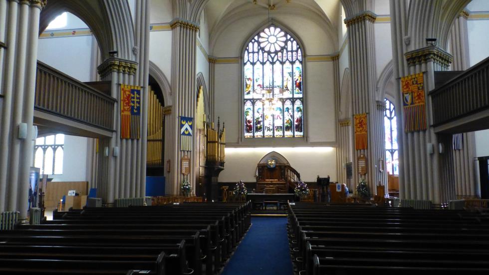 Looking from the Transept toward the Alter. The Last Supper is portrayed above the Alter.