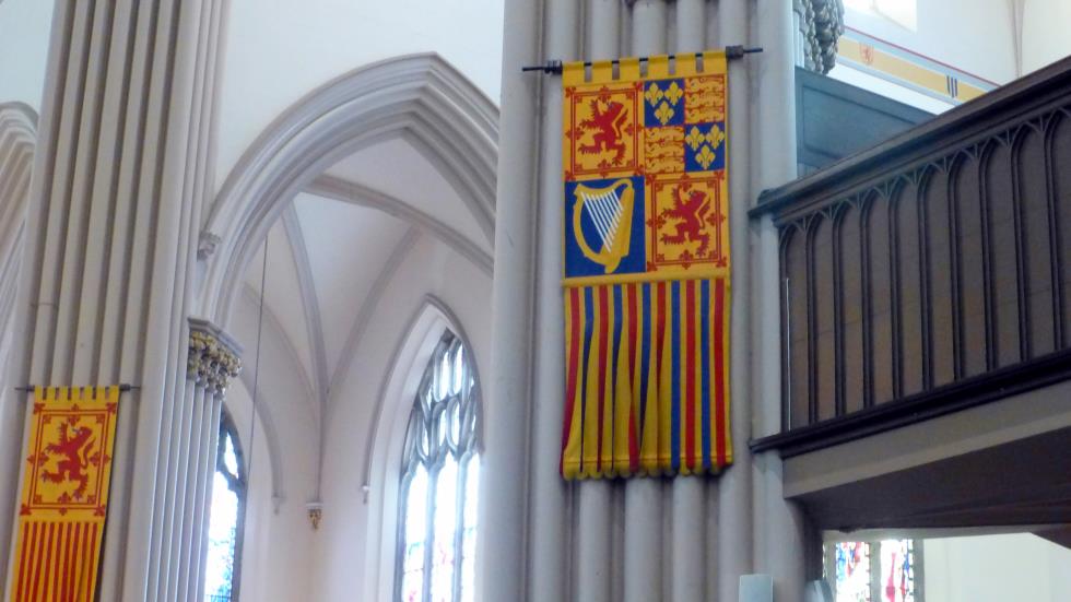 One of the many banners displayed throughout the Abbey. This displays the Coats of Arms of (from upper left, clockwise) Scotland with its Rampant Lion, England with its Lion Passant and Fleurs-de-lis, and Ireland with its Harp.