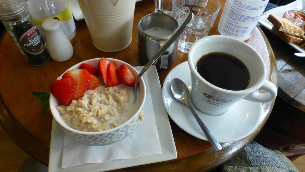 My Porridge, strawberries and most excellent coffee at the Old Town Coffee House.