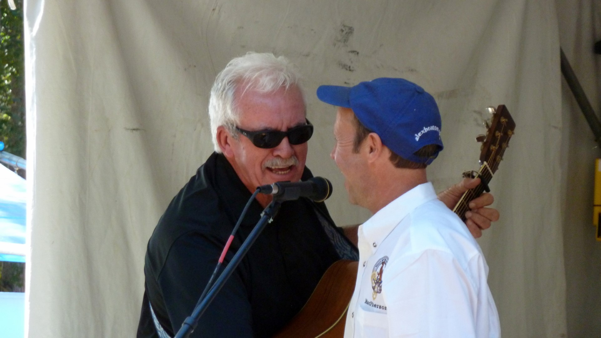 Alex and Tom McPherson close out his set with a rendition of “Big Bad John”