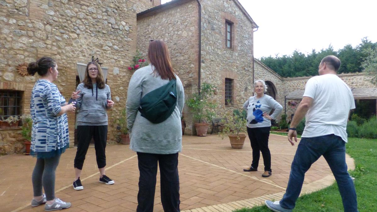 Amy, Missy, Erin, our hostess Giuseppina and Steve standing in the courtyard